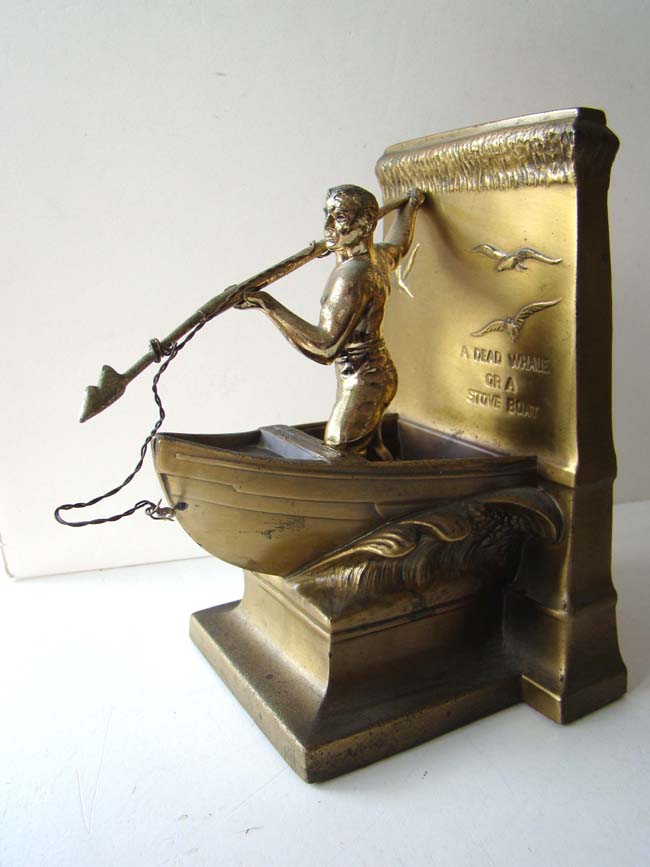 A nice pair of NEW BEDFORD WHALING MONUMENT brass bookends circa 1950.
